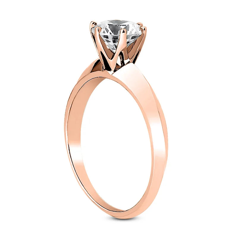 Solitaire diamant taille émeraude en or 14 carats