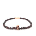 Garnet Bead Stretch Bracelet with Rose Vermeil Skull Detail