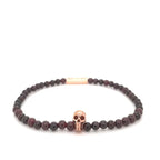 Garnet Bead Stretch Bracelet with Rose Vermeil Skull Detail