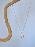 14 Karat Yellow Dew Drop Year of The Snake Medallion Necklace
